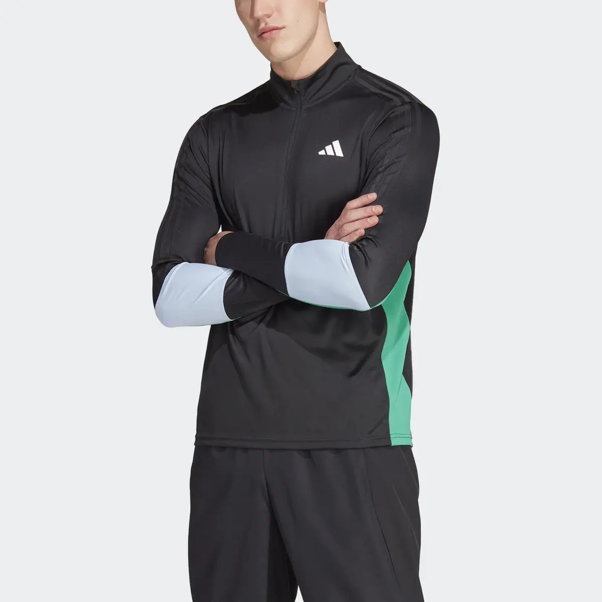 Adidas T-shirt de training à manches longues et zip 1/4 Colorblock. 1