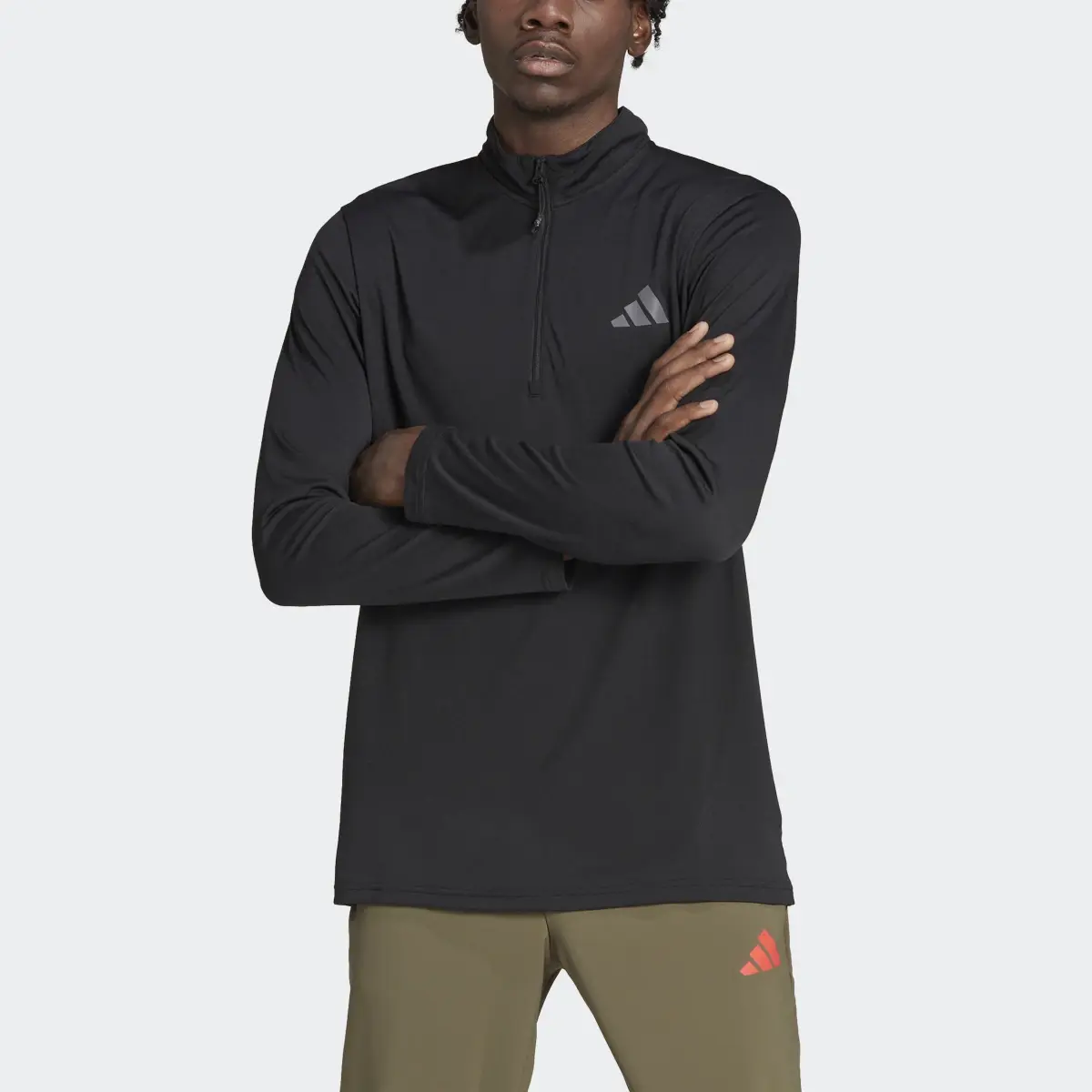 Adidas Train Essentials Seasonal Training 1/4-Zip Long Sleeve Tee. 1