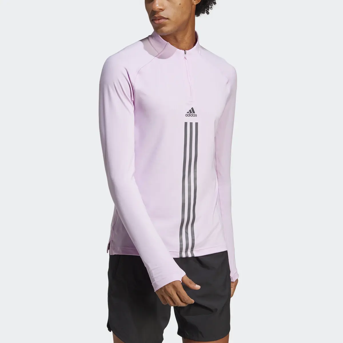 Adidas AlphaStrength 1/4 Zip Long Sleeve Top. 1