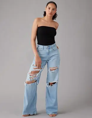 American Eagle Dreamy Drape Stretch Curvy Super High-Waisted Ripped Baggy Wide-Leg Jean. 1