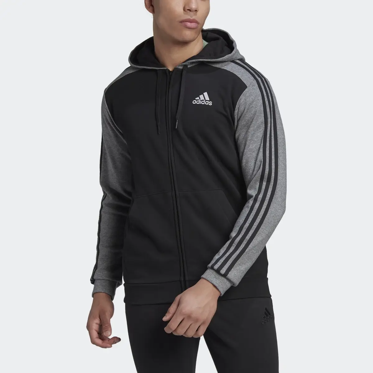 Adidas Chaqueta con capucha Essentials Mélange French Terry. 1