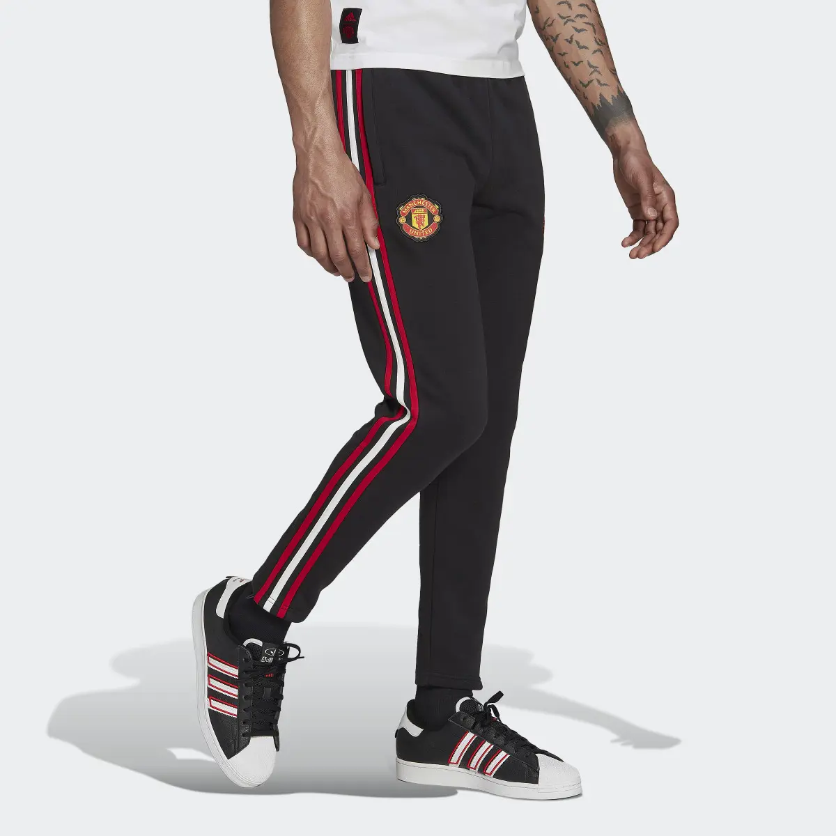 Adidas Manchester United DNA 3-Stripes Tracksuit Bottoms. 3