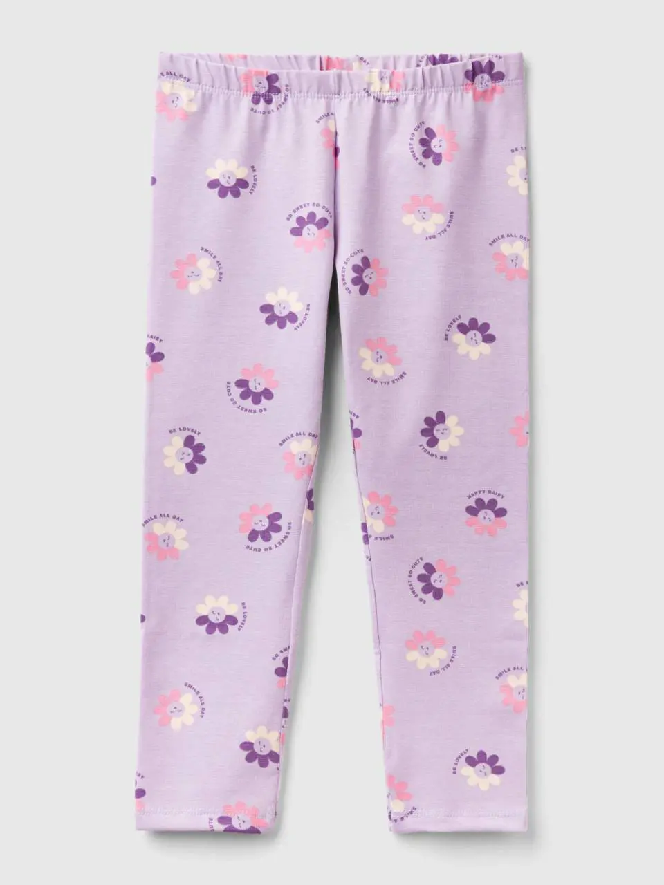Benetton lilac leggings with floral print. 1