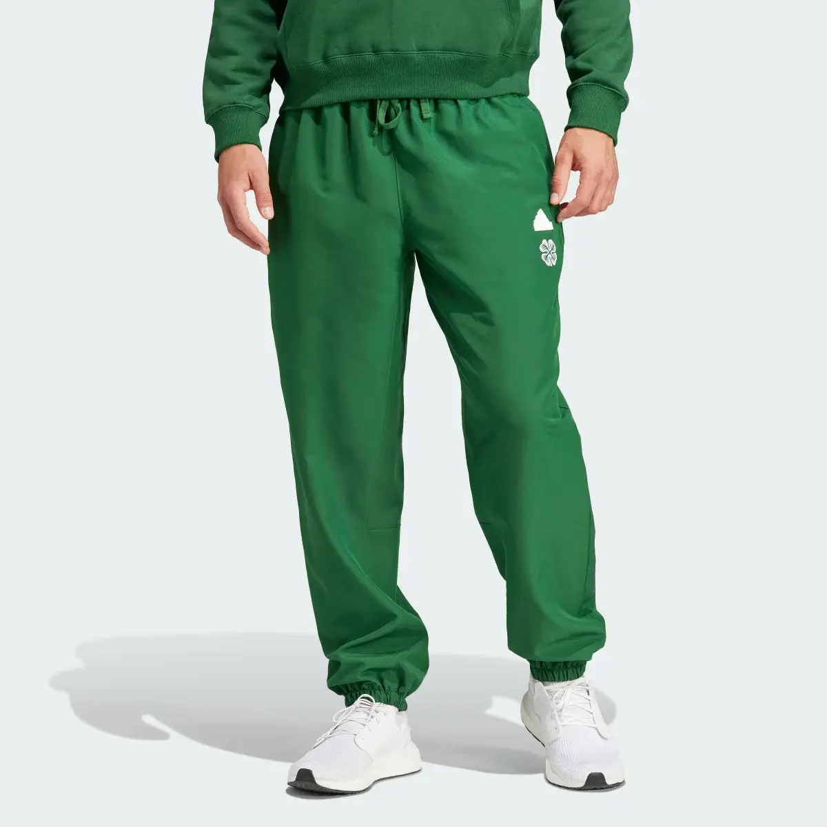 Adidas Celtic FC LFSTLR Woven Tracksuit Bottoms. 1