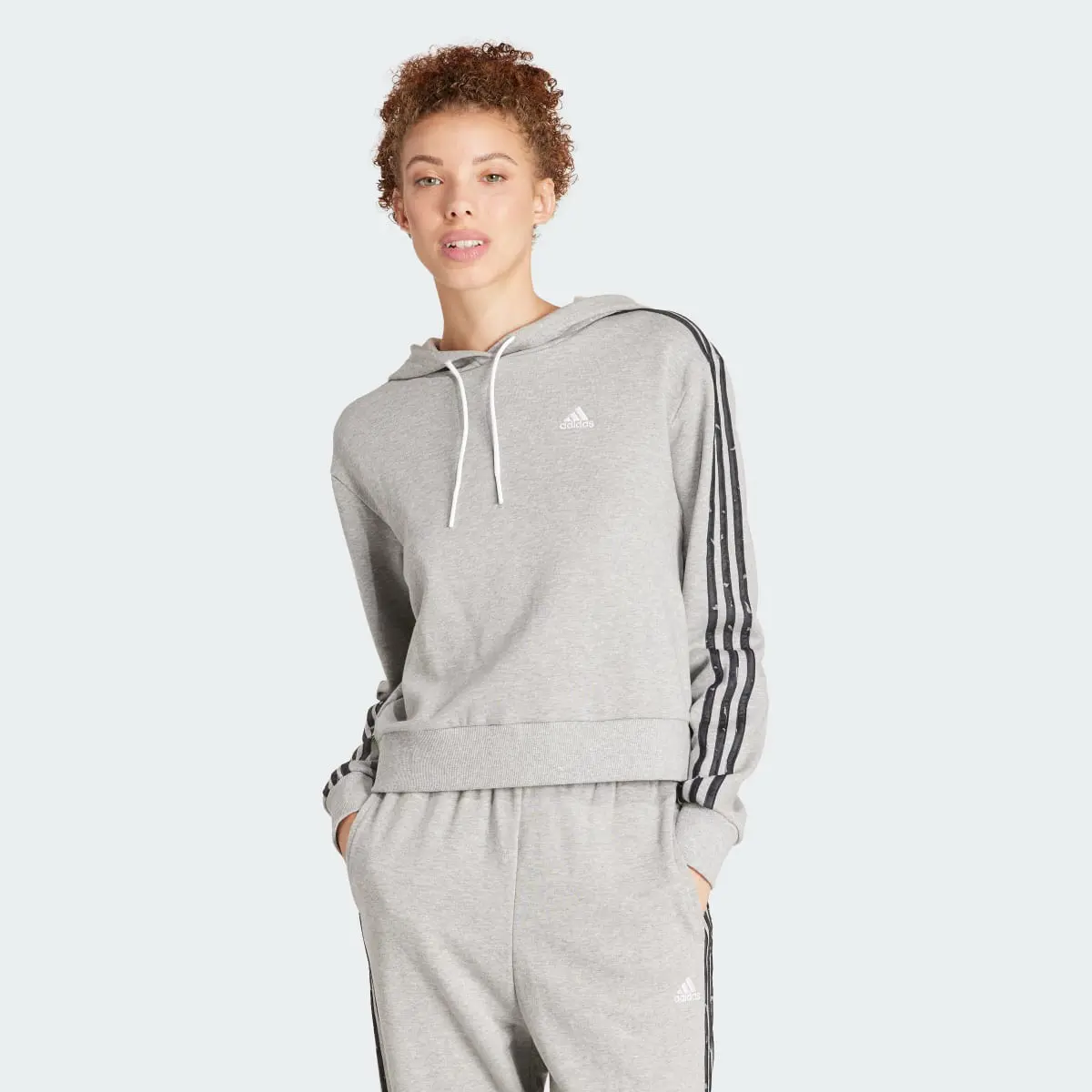 Adidas Essentials 3-Stripes Animal Print Relaxed Hoodie. 2