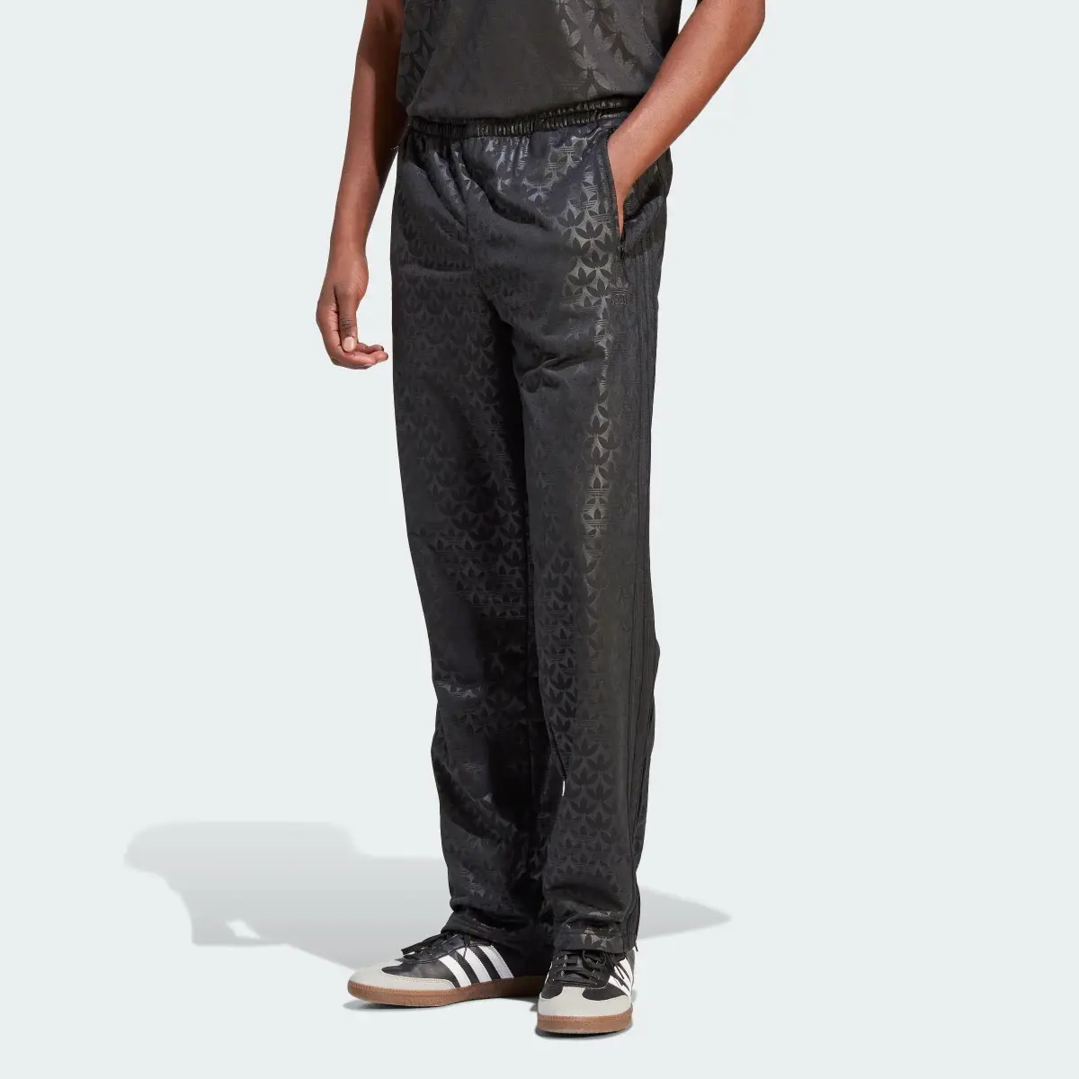 Adidas Pantalon de survêtement motif monogramme Firebird. 1