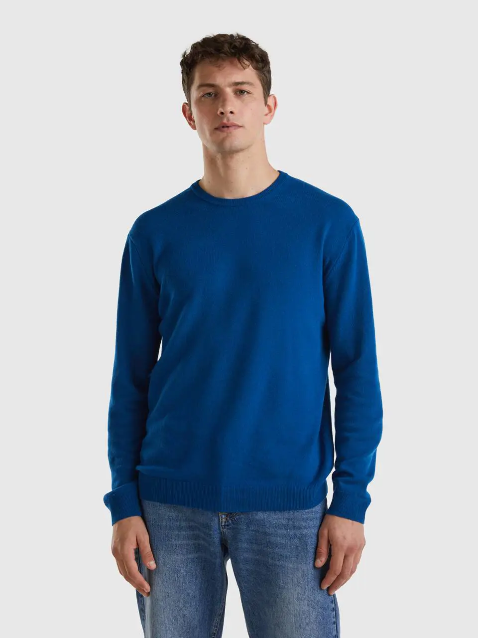 Benetton blue crew neck sweater in pure merino wool. 1