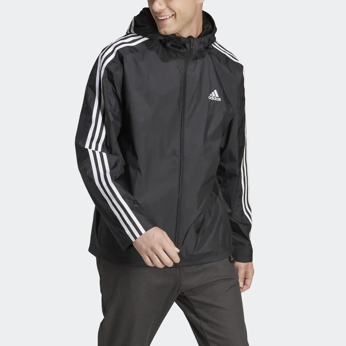 Adidas Essentials 3-Stripes Woven Windbreaker. 1