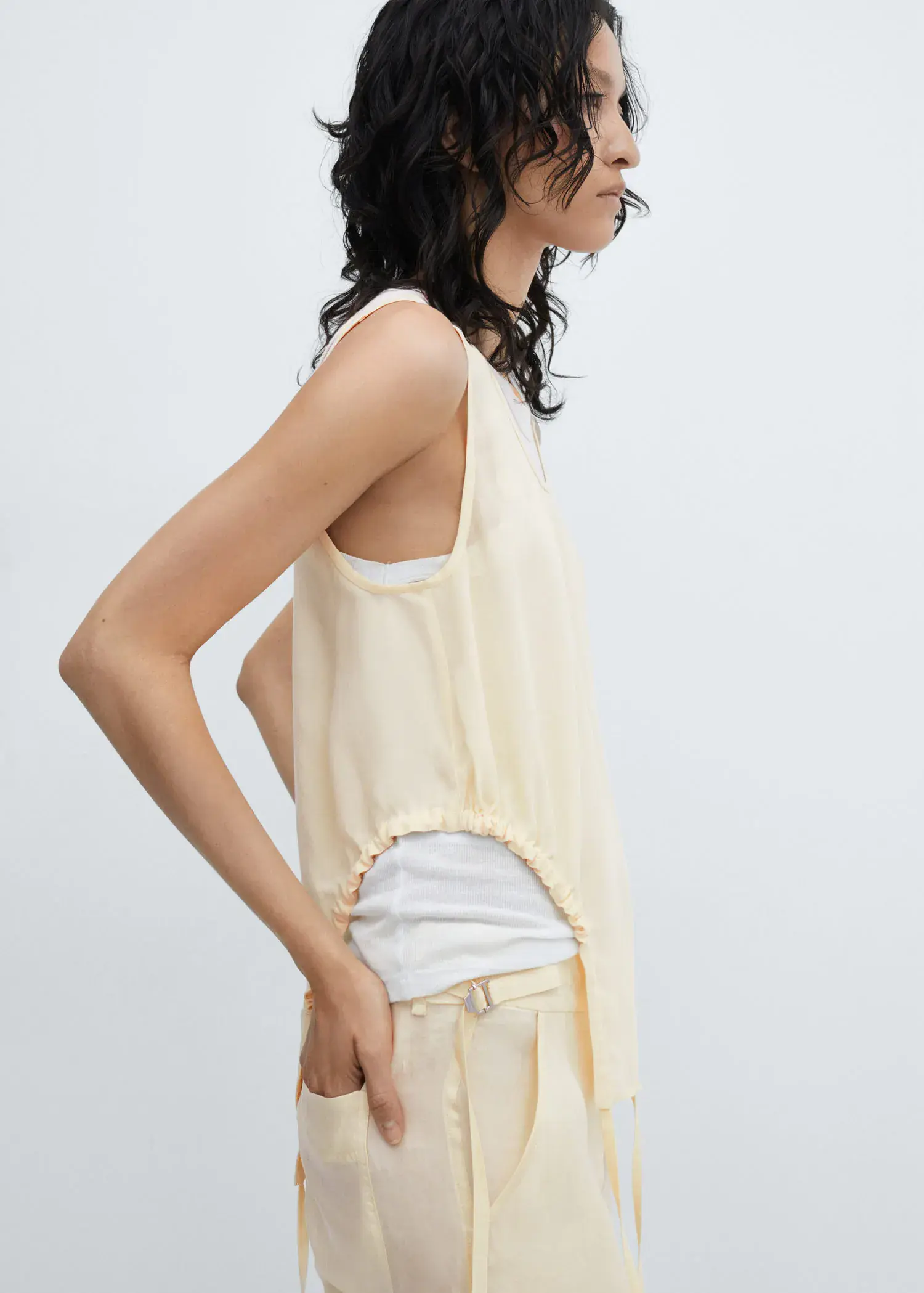 Mango Semitransparent top with side pleats. 2