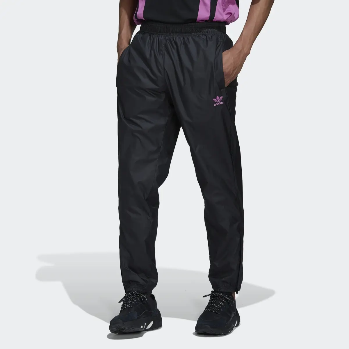 Adidas Rekive Graphic Tracksuit Bottoms. 1