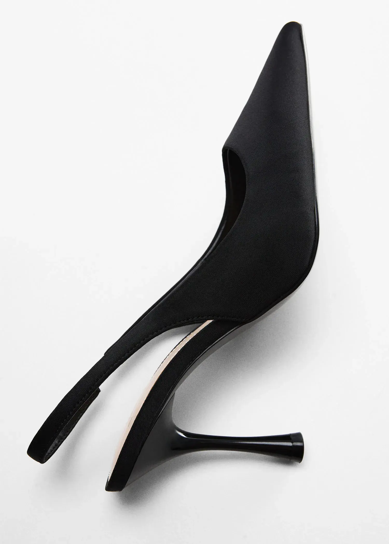 Mango High-heeled shoes. a pair of high heeled shoes on a white surface. 