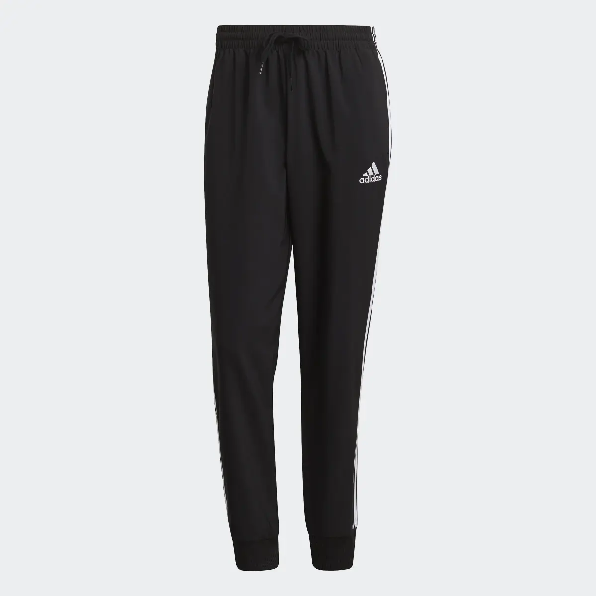 Adidas AEROREADY Essentials Tapered Cuff Woven 3-Streifen Hose. 1