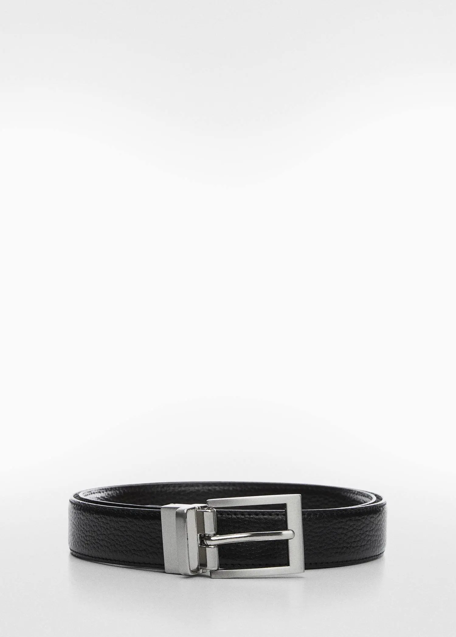 Mango Dress with leather belt. a close-up of a black belt with a silver buckle. 