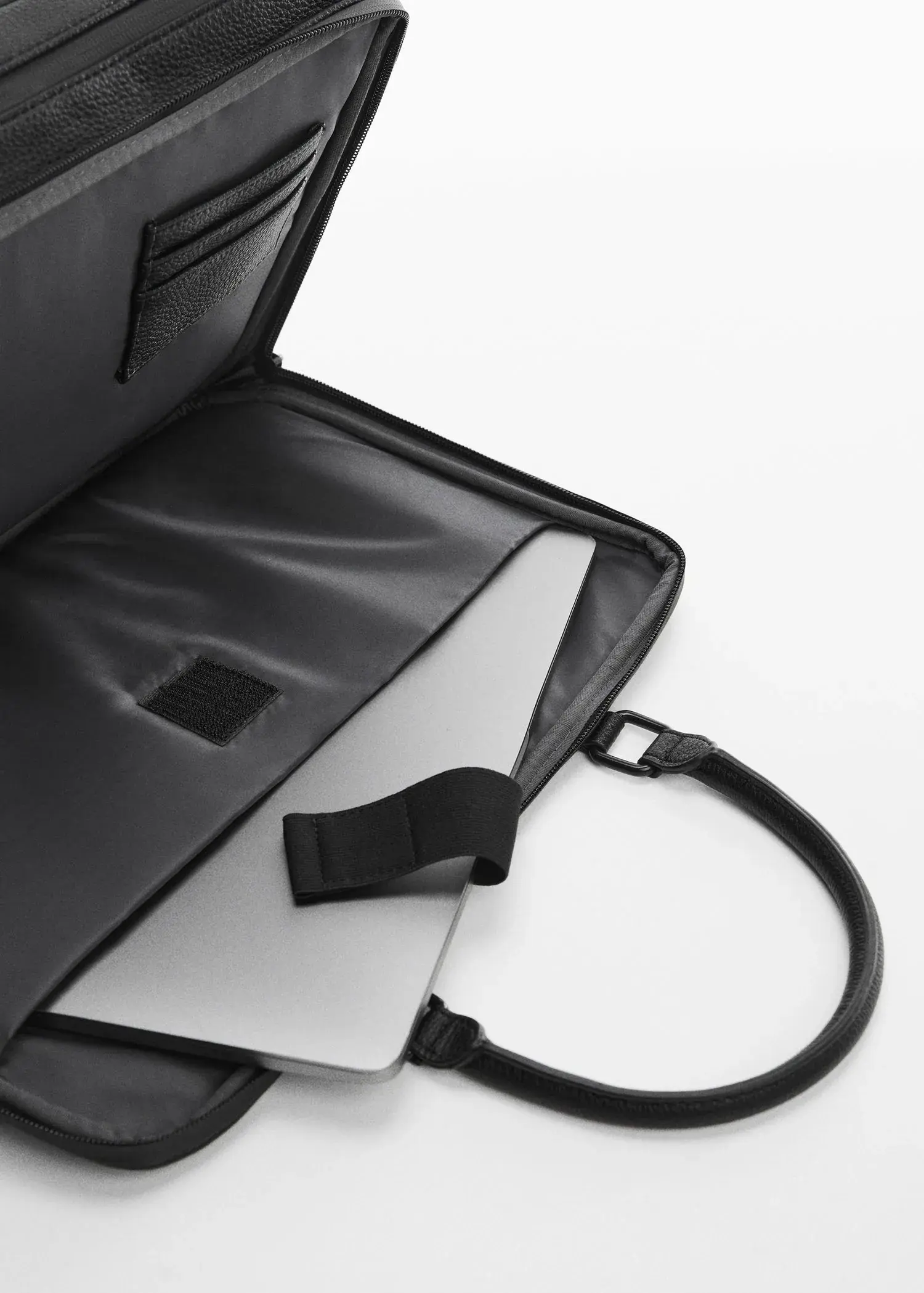 Mango Leather-effect briefcase. an open laptop case with a strap around the handle. 