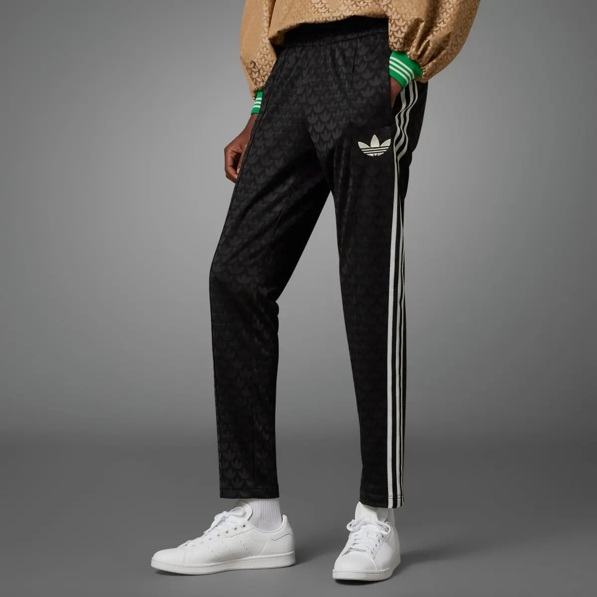 Adidas Adicolor 70s Monogram Track Pants. 1