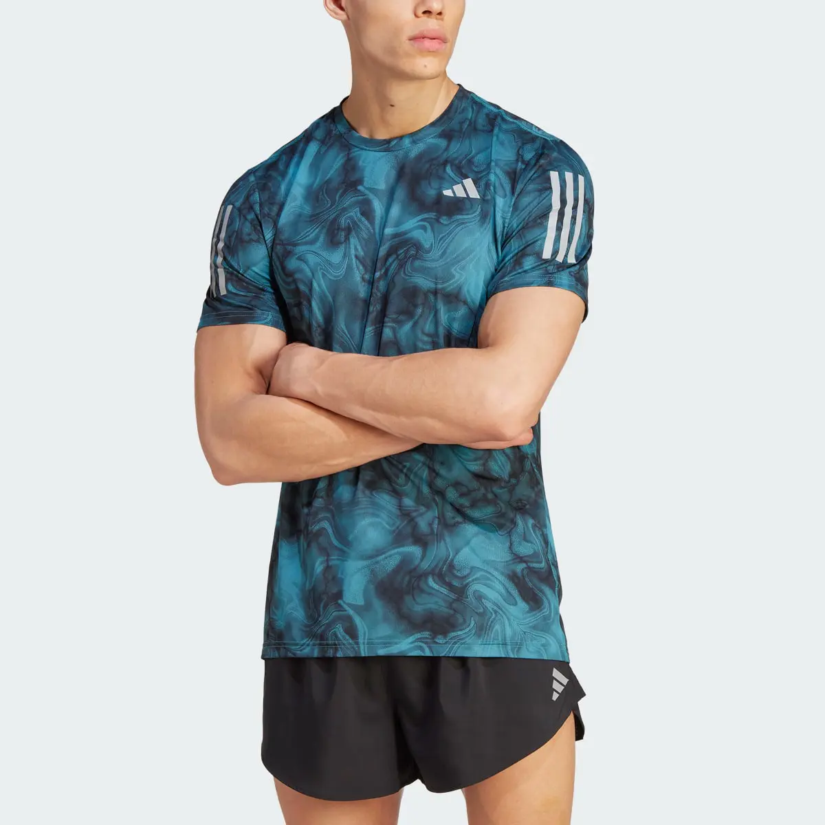 Adidas Own the Run Allover Print T-Shirt. 1