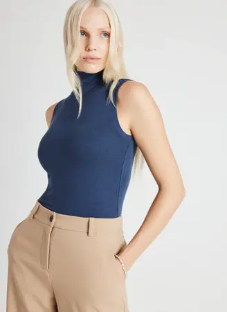 Kit And Ace Kit Sleeveless Turtleneck. 1