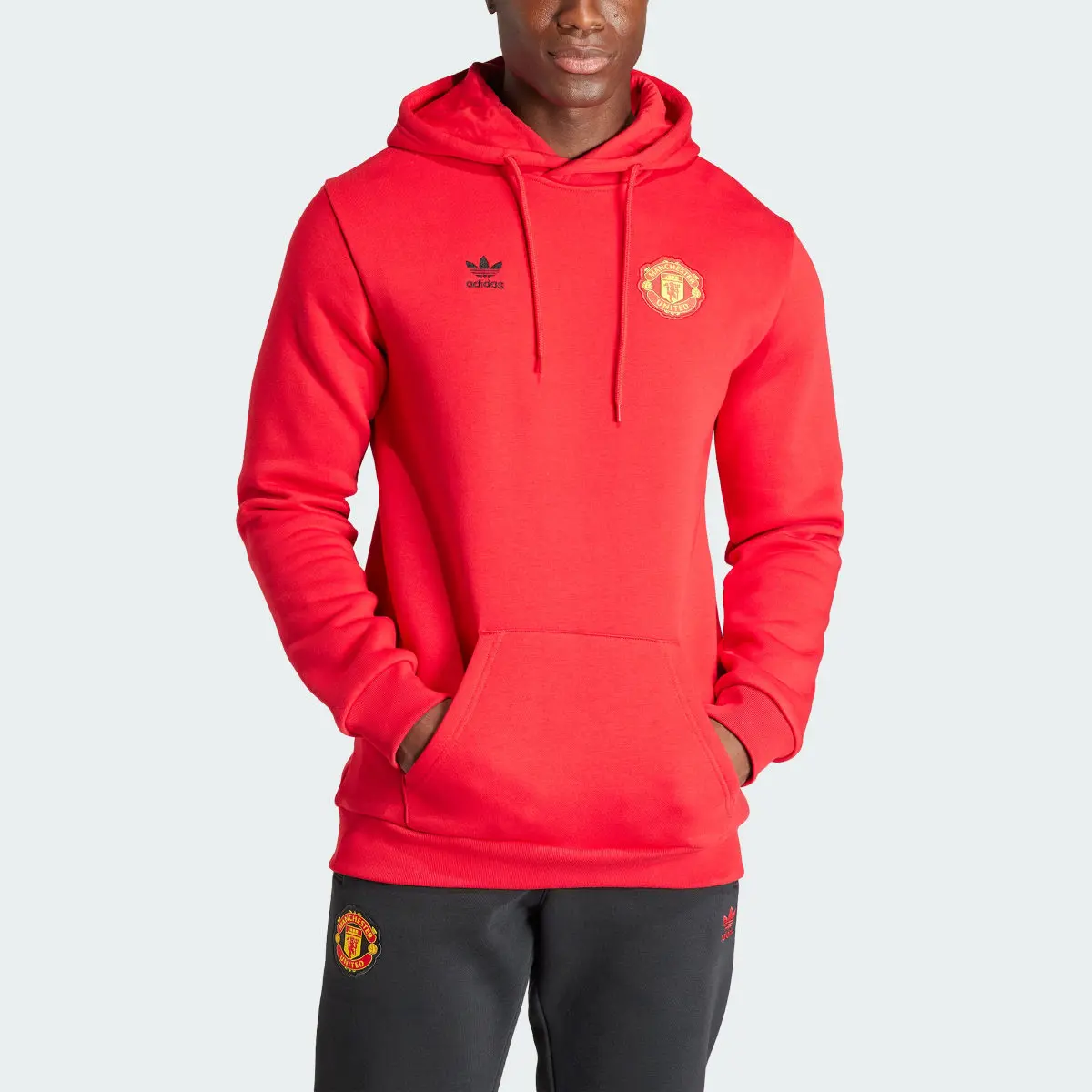 Adidas Sweat-shirt à capuche Trèfle Manchester United Essentials. 1