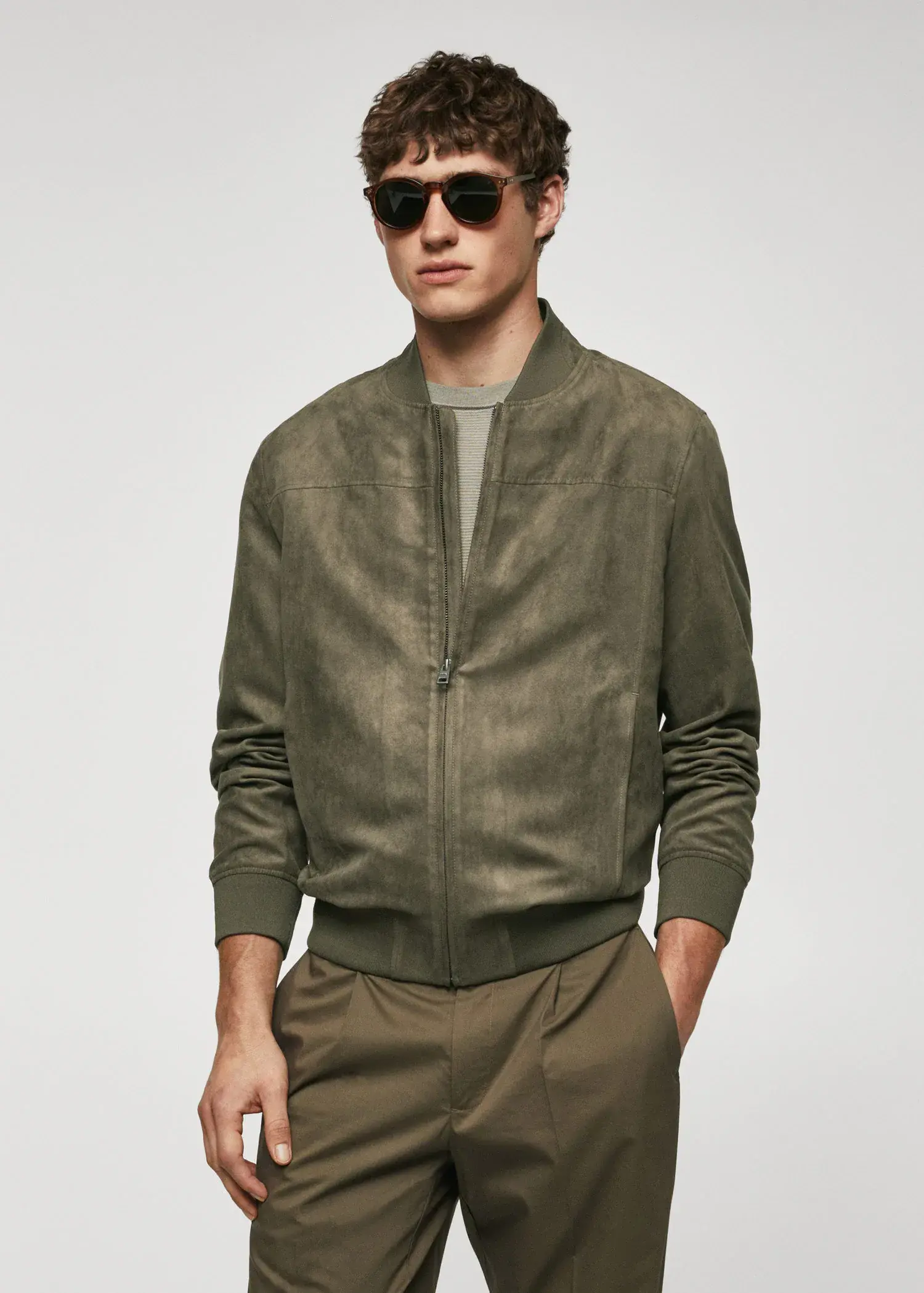 Mango Suede-effect bomber jacket. a man wearing a green jacket and sunglasses. 
