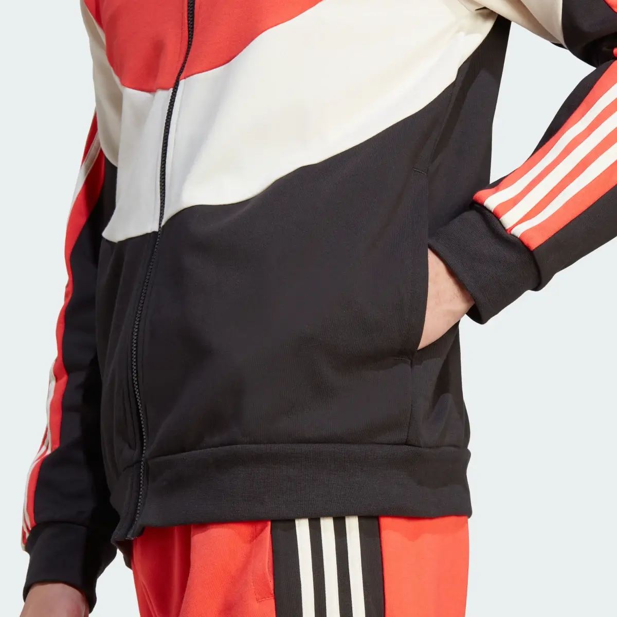 Adidas Track suit Colorblock. 3