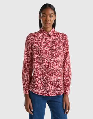 red shirt with white polka dots