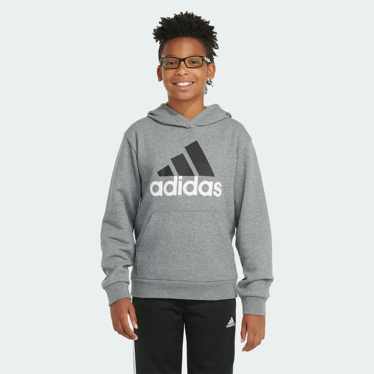 Adidas Long Sleeve Essential Heather Fleece Hoodie. 1