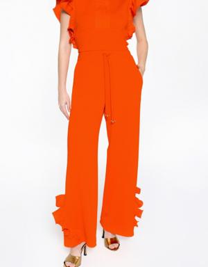 Orange Tracksuit With Elastic Back With Embroidered Lace-up Detail With Ruffle at the End of the Trotters