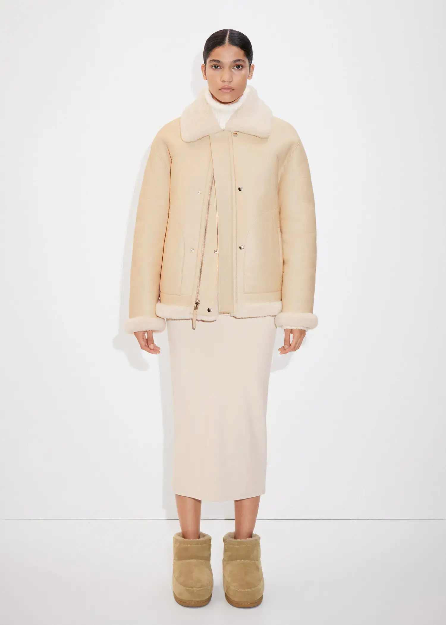 Mango Reversible leather and fur-effect coat. 1