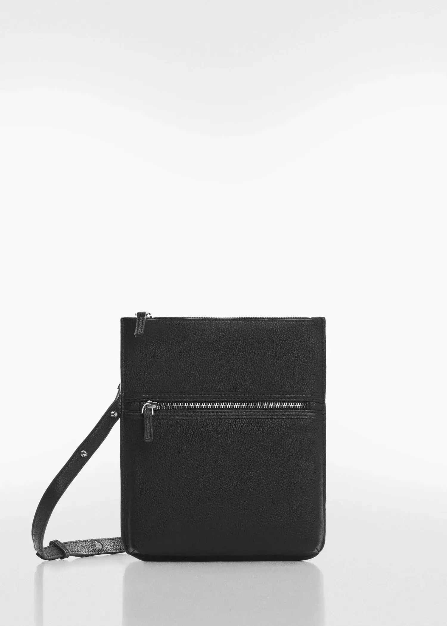 Mango Leather effect zippered shoulder bag. a black bag with a wrist strap on a white surface. 