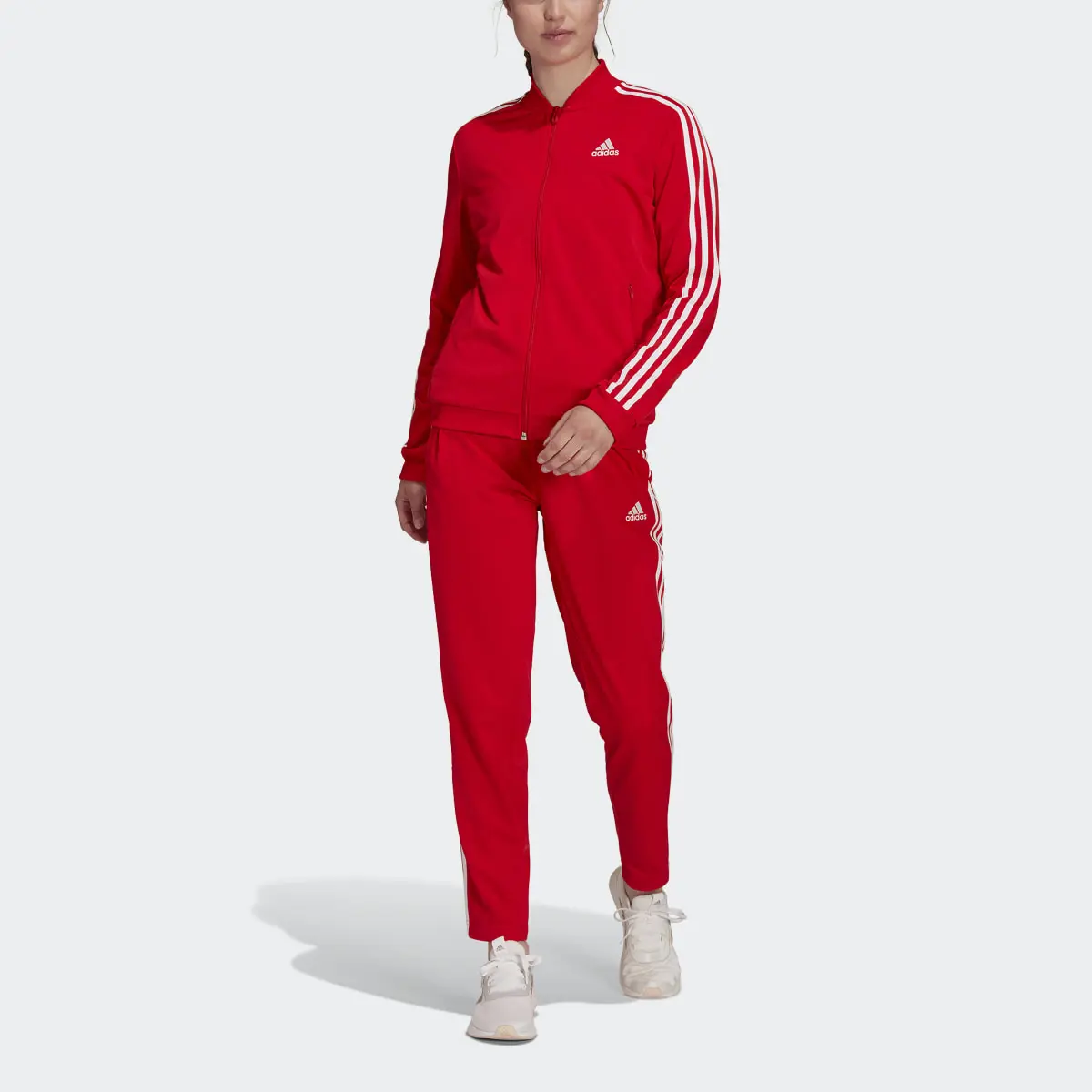 Adidas Essentials 3-Stripes Track Suit. 1