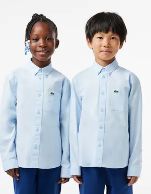 Camisa infantil Lacoste con bolsillo a contraste