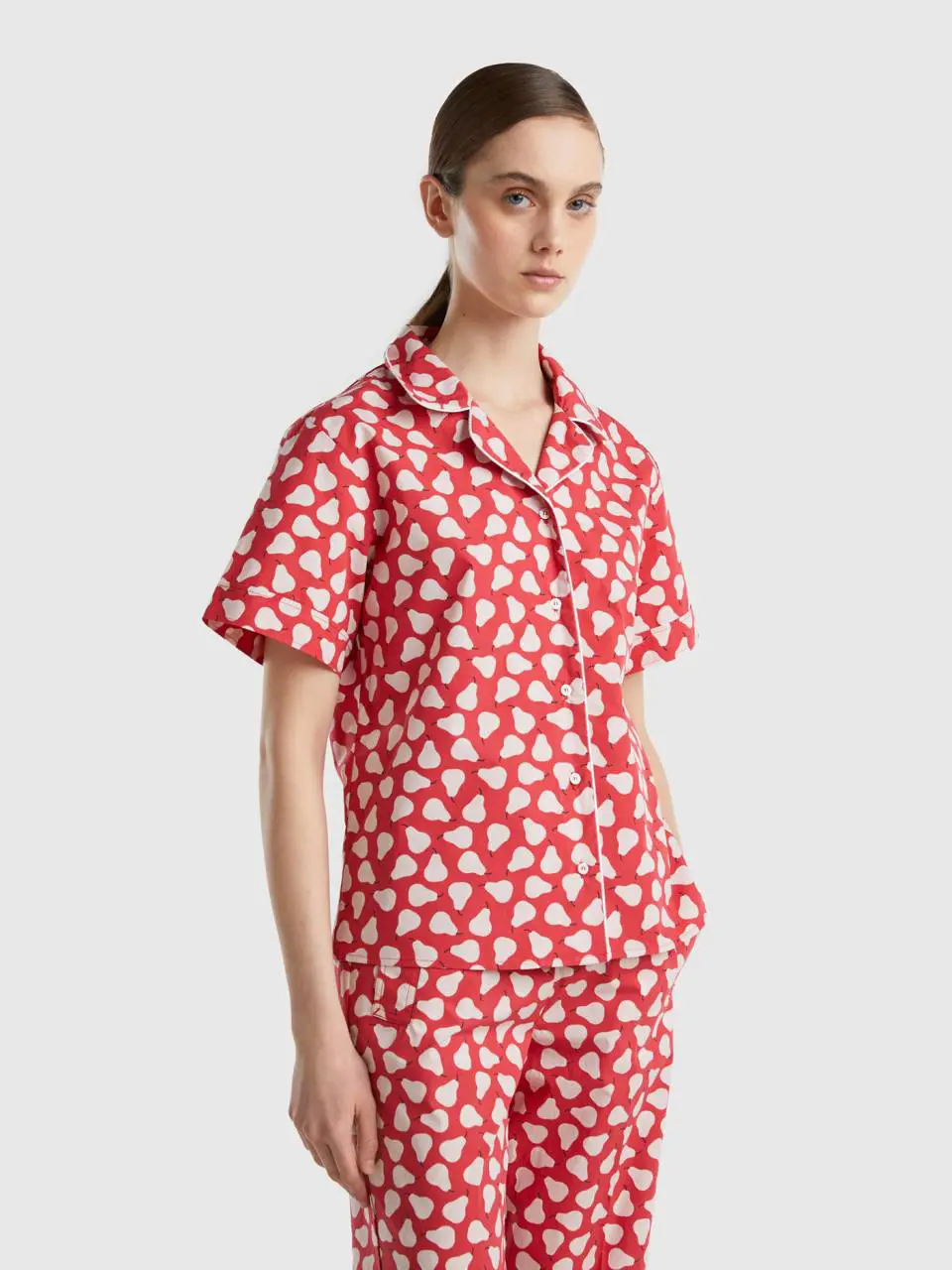 Benetton red shirt with pear pattern. 1