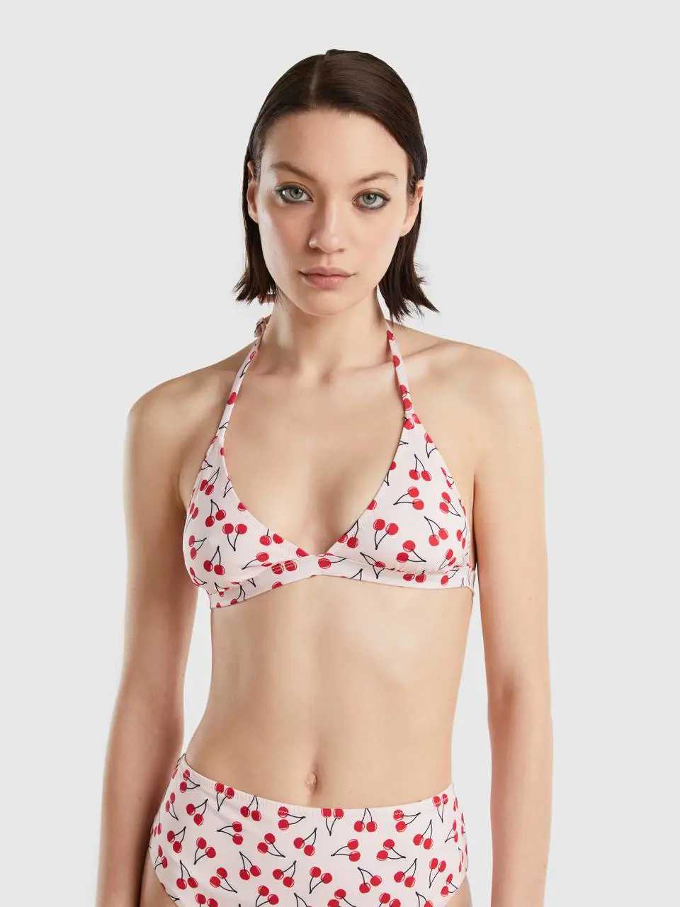 Benetton pink triangle bikini top with cherry pattern. 1
