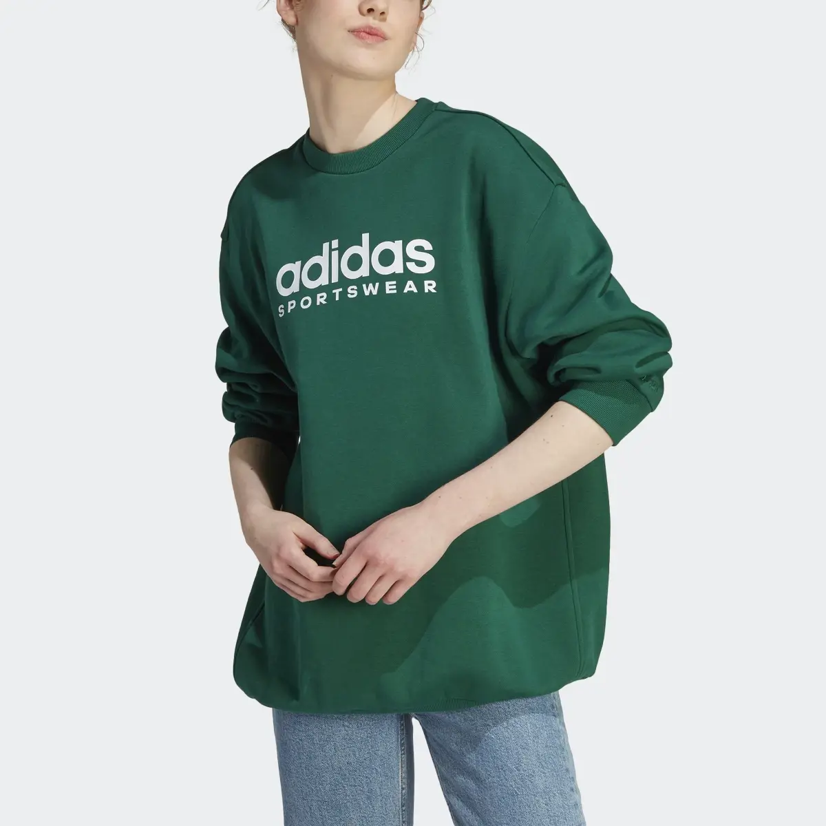 Adidas ALL SZN Fleece Graphic Sweatshirt. 1