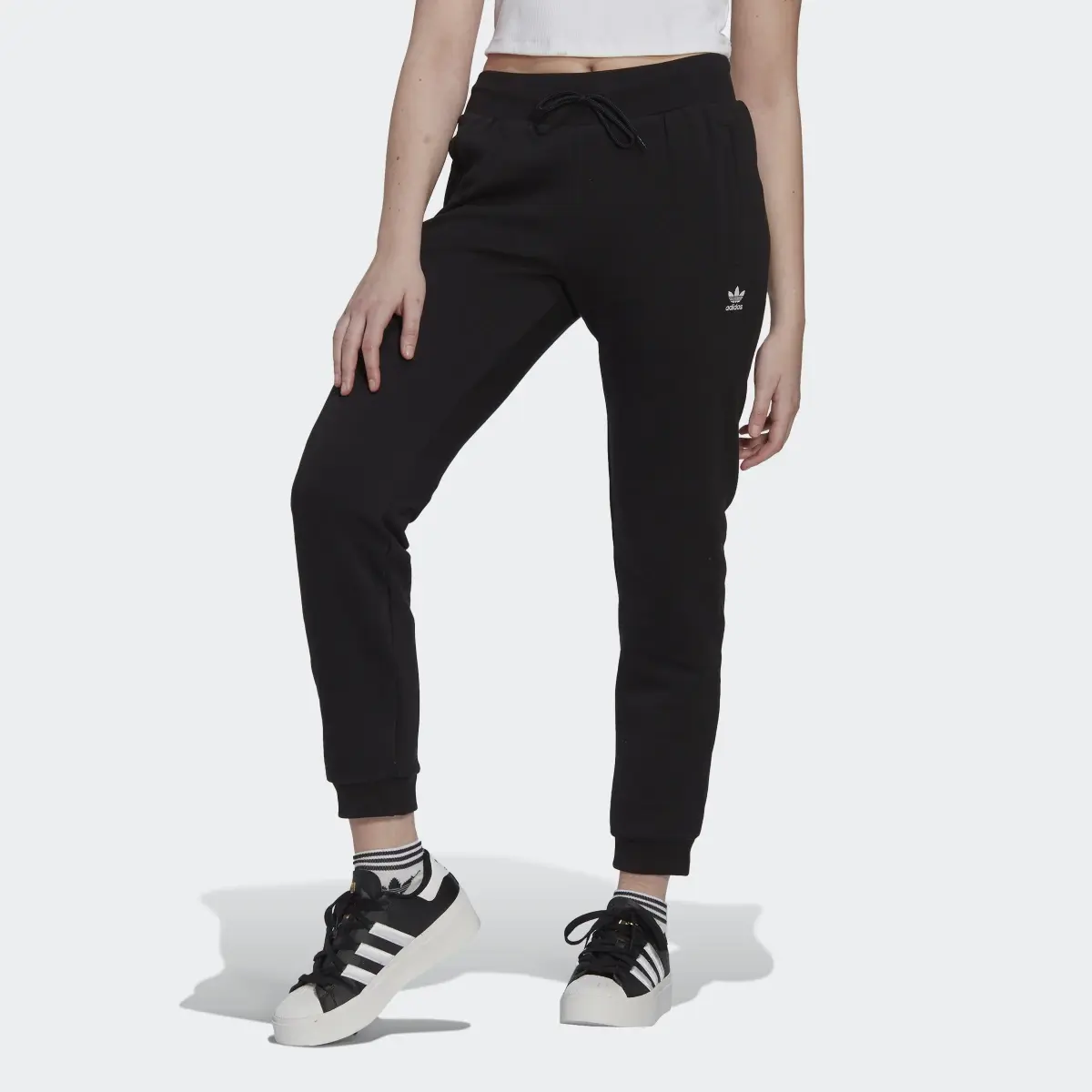 Adidas Pantalon sportswear Adicolor Essentials. 1