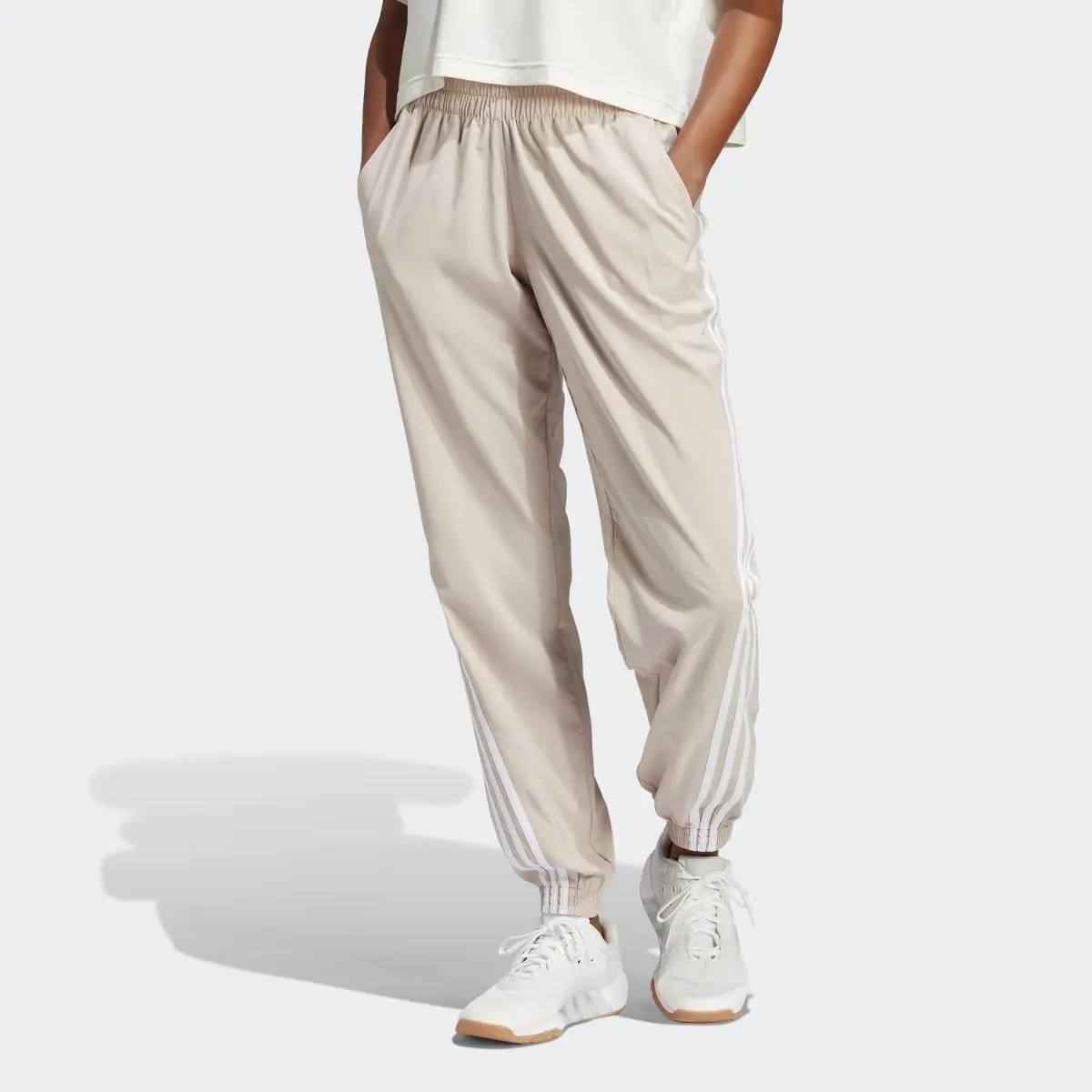 Adidas TRAINICONS 3-Stripes Woven Pants. 1