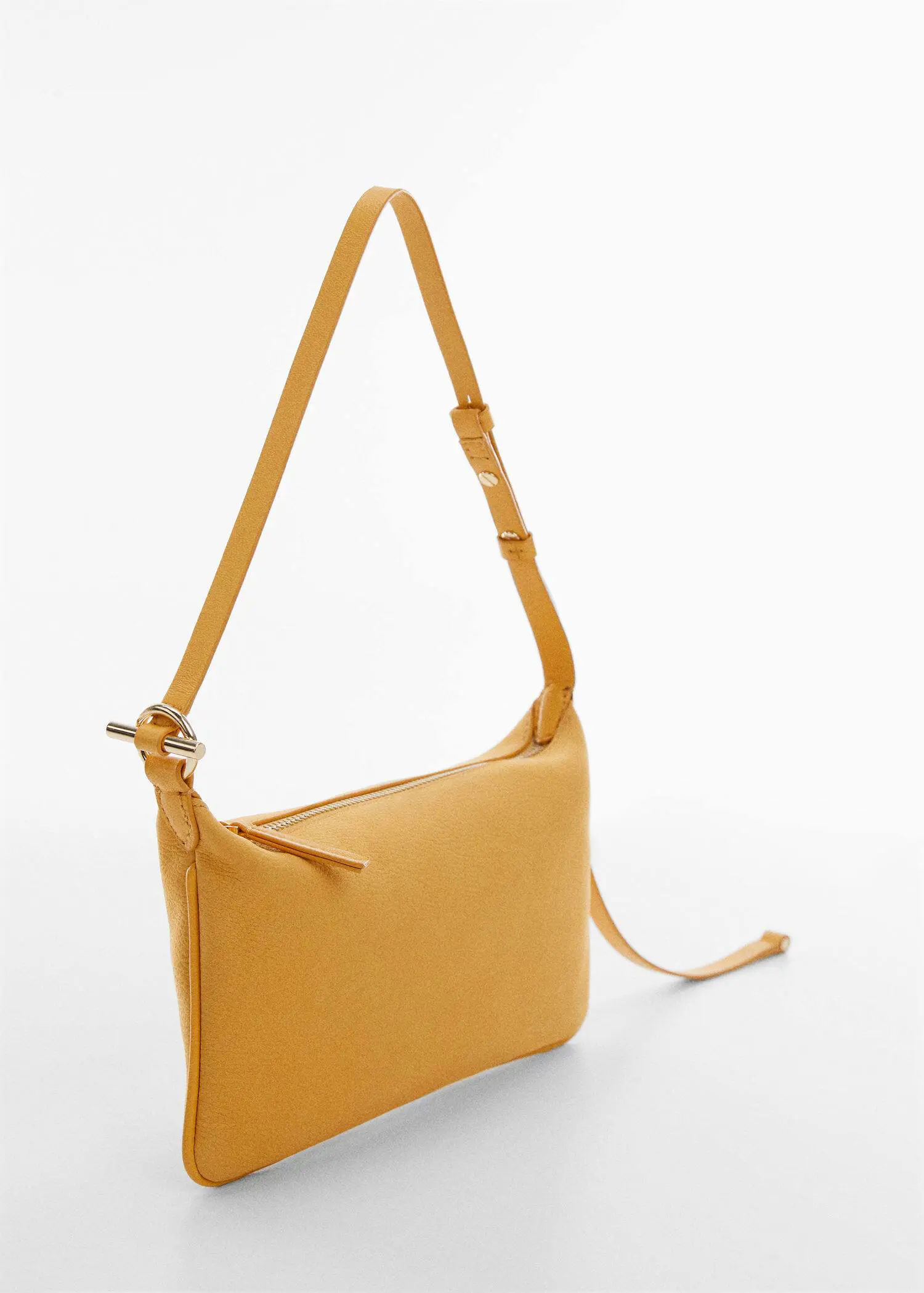 Mango Leather bag with metallic detail. a yellow purse is shown on a white surface. 