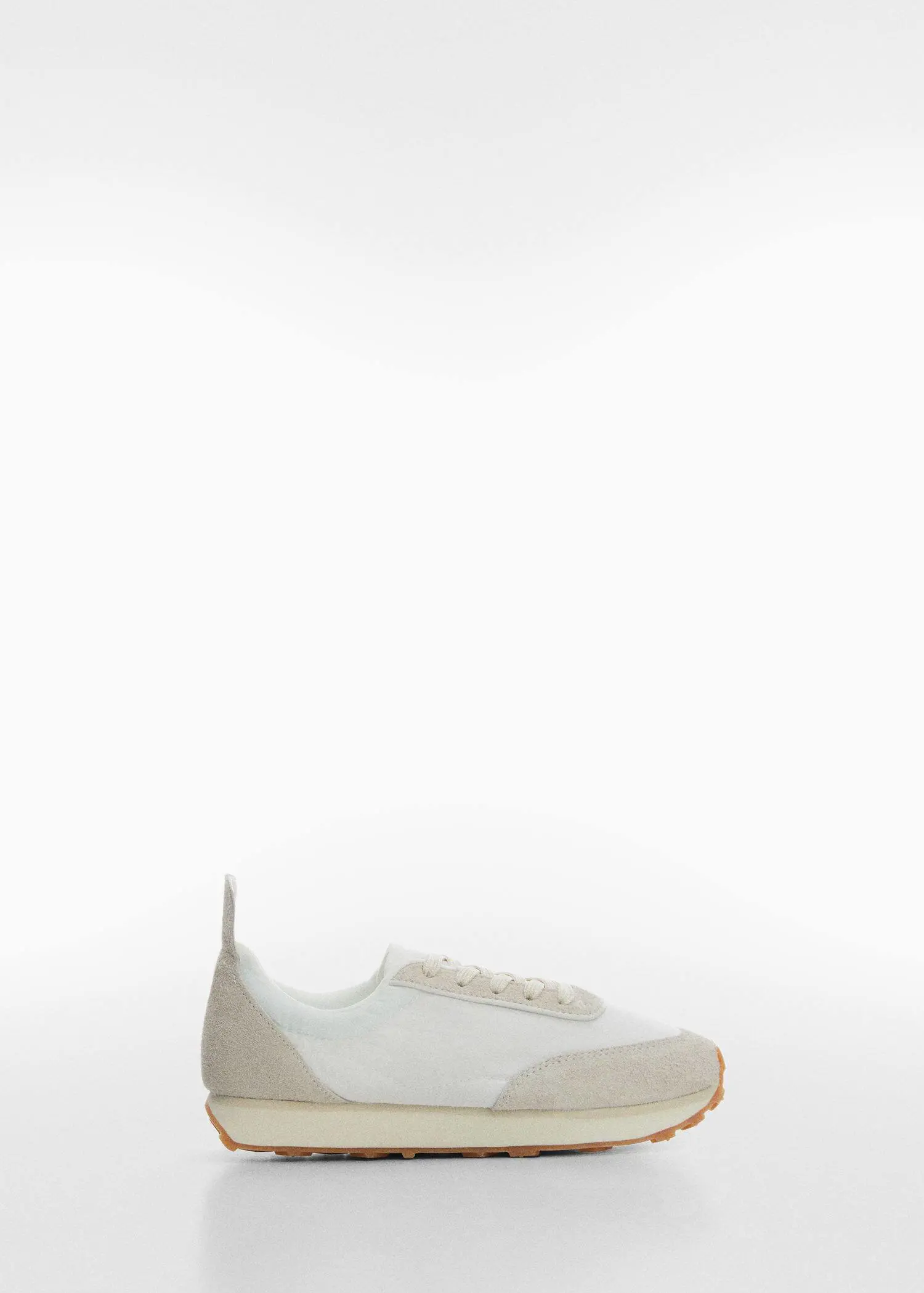 Mango Contrast panel sneakers. a pair of white shoes on a white background 