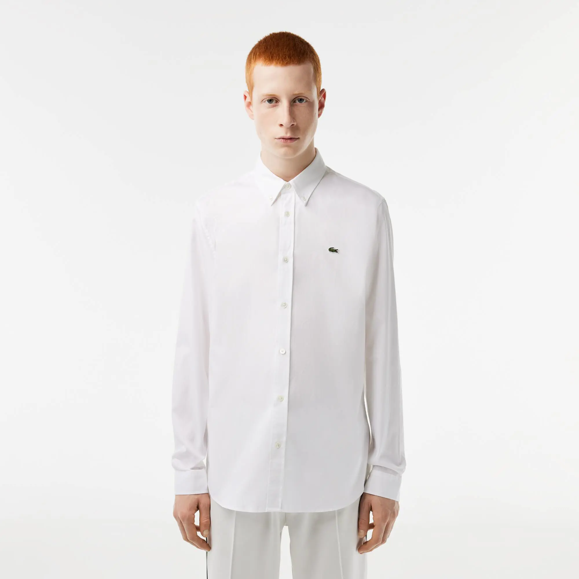 Lacoste Chemise slim fit unie en coton premium. 1