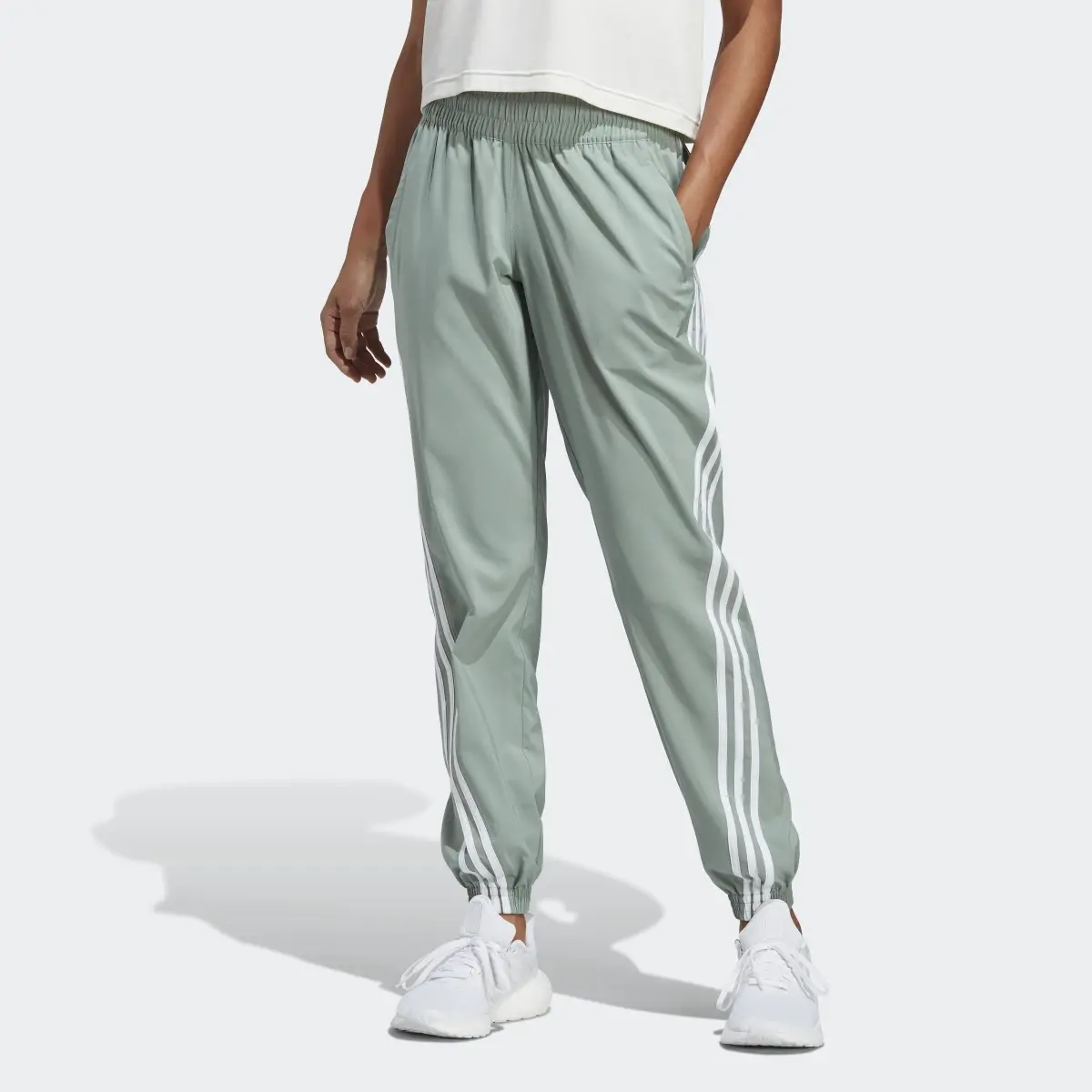 Adidas TRAINICONS 3-Stripes Woven Pants. 1
