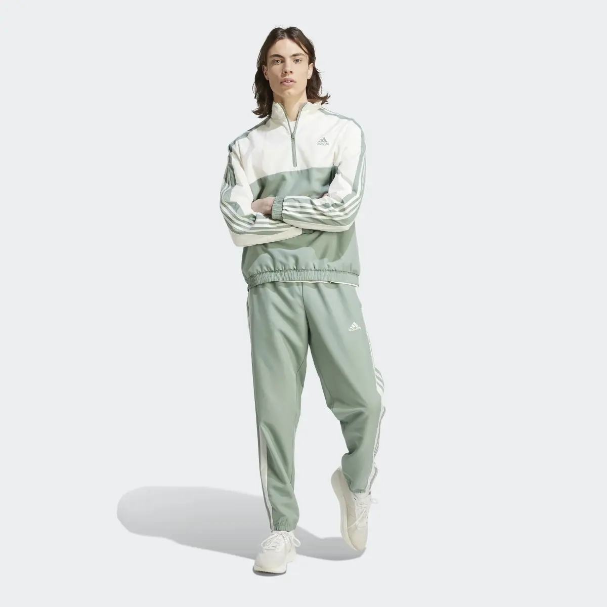 Adidas 1/4 Zip Woven Track Suit. 2