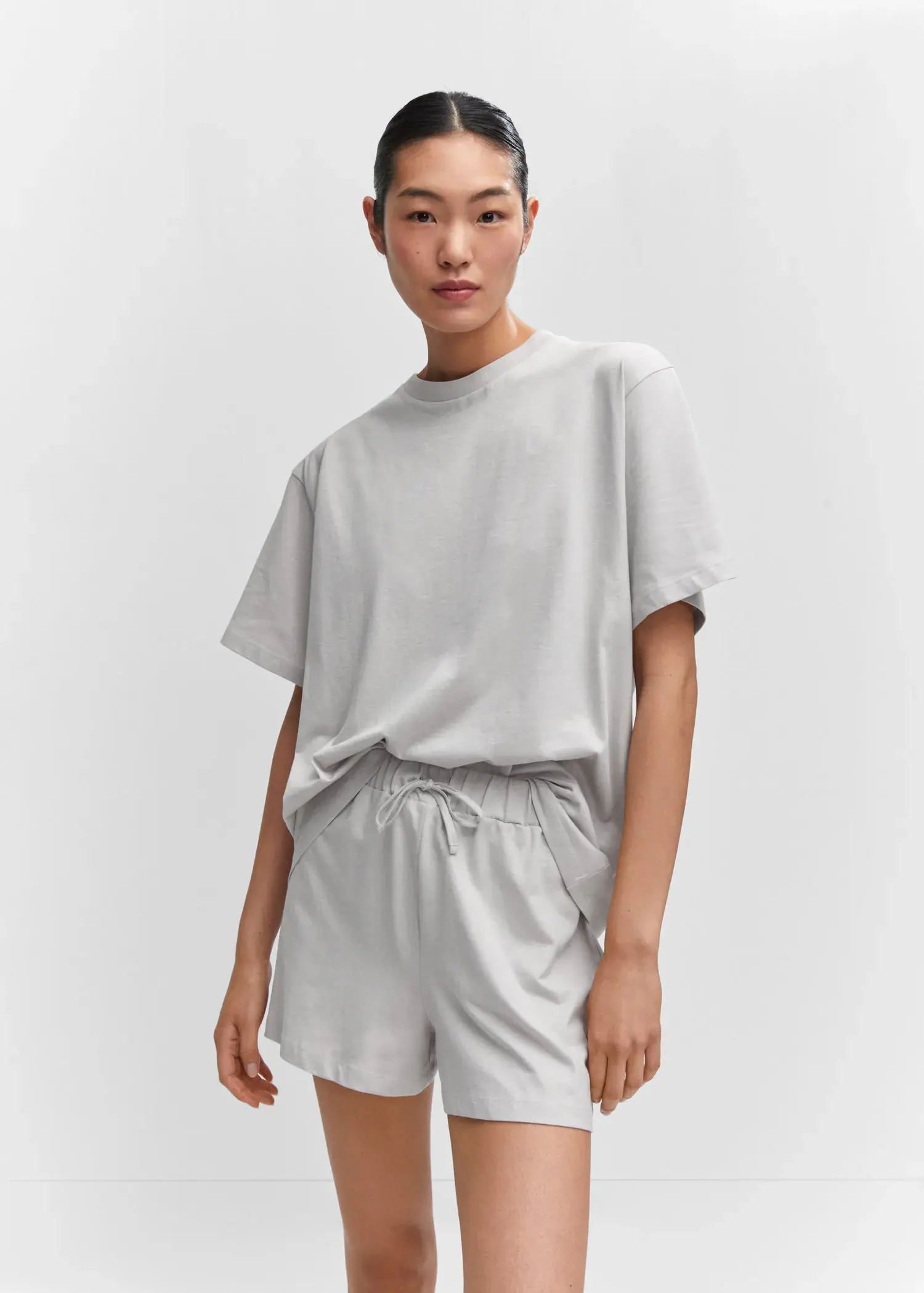 Mango Short cotton pyjamas. a person wearing a white shirt and shorts. 