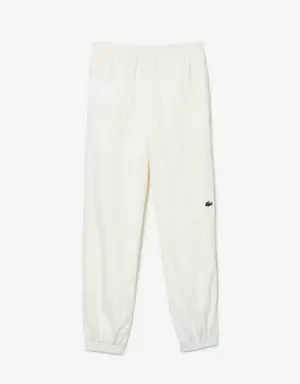 Pantalón de chándal de hombre Lacoste hidrófugo con diseño patchwork