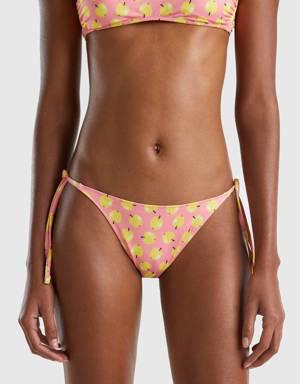 pink swim bottoms with apple pattern