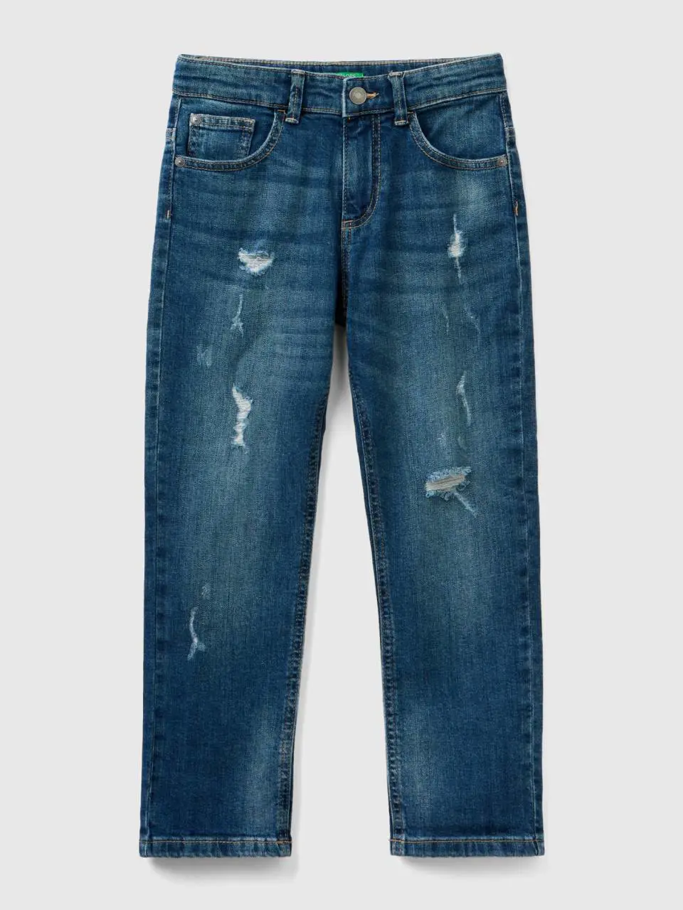 Benetton slim fit jeans with tears. 1