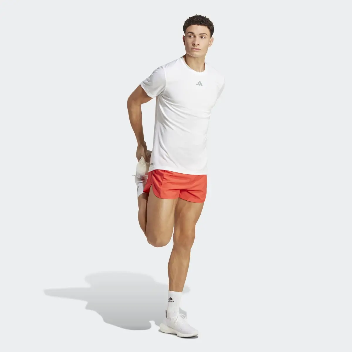 Adidas Own the Run Split Shorts. 3