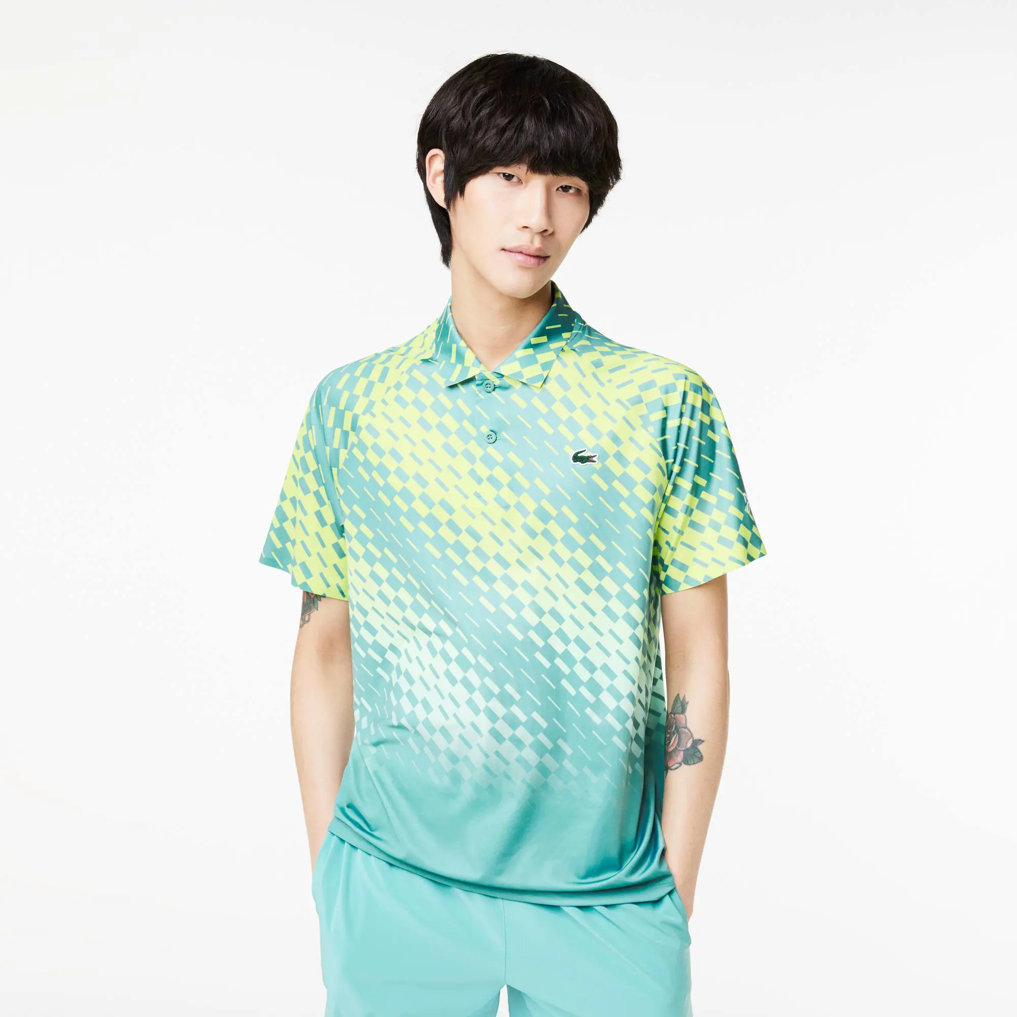 Lacoste Herren-Poloshirt im Schachbrettmuster LACOSTE TENNIS x Novak Djokovic Player version. 1 Lacoste Herren-Poloshirt im Schachbrettmuster LACOSTE TENNIS x Novak Djokovic Player version. 1