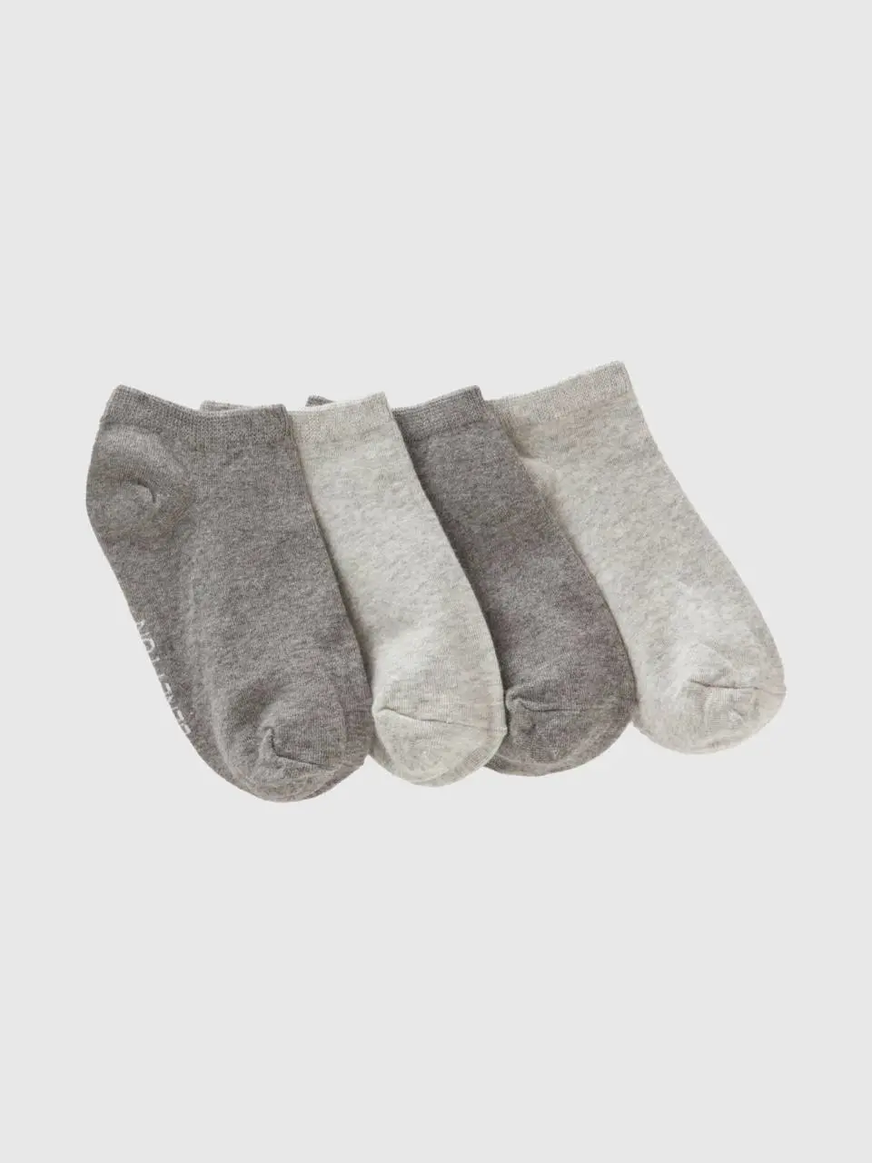 Benetton four pairs of short socks. 1