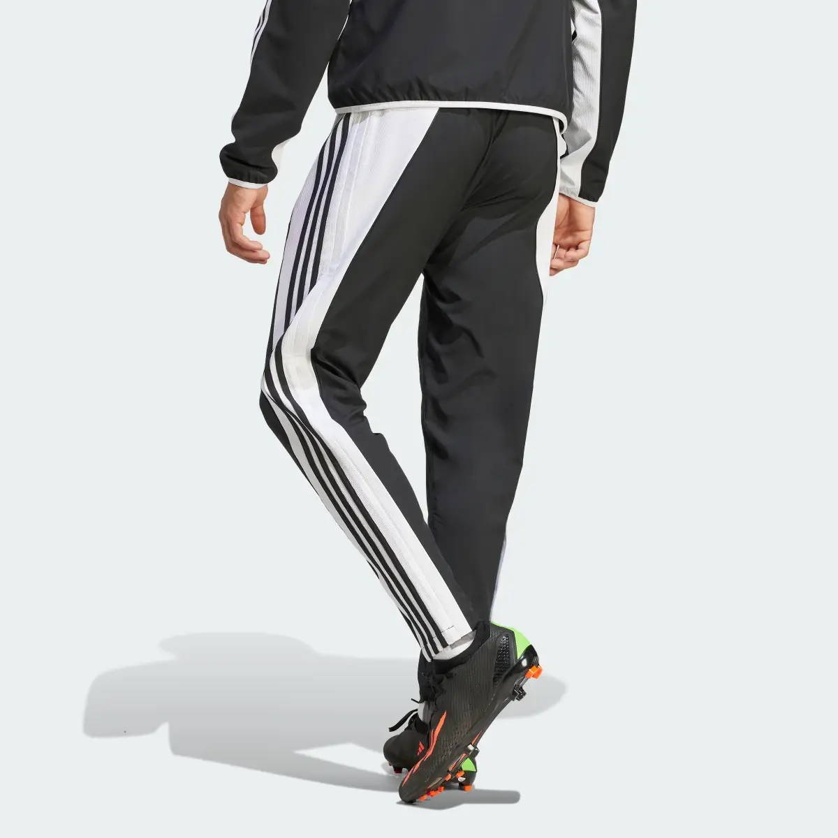 In motion.# Adidas Tiro pants are essential this season.
