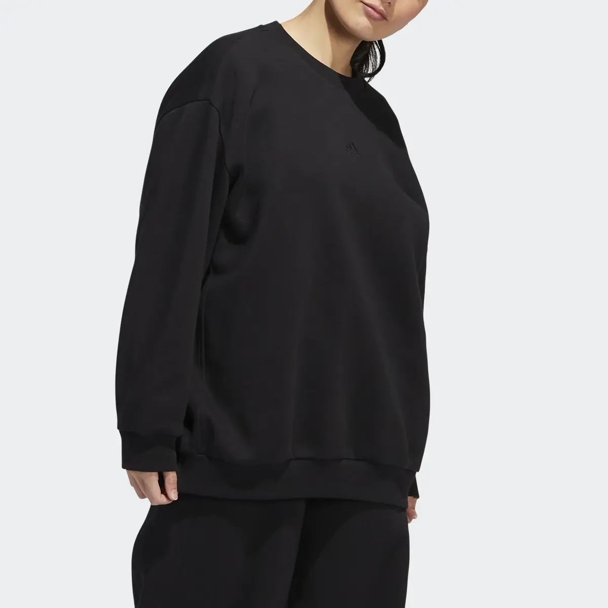 Adidas All-Season Fleece Oversized Sweatshirt. 1
